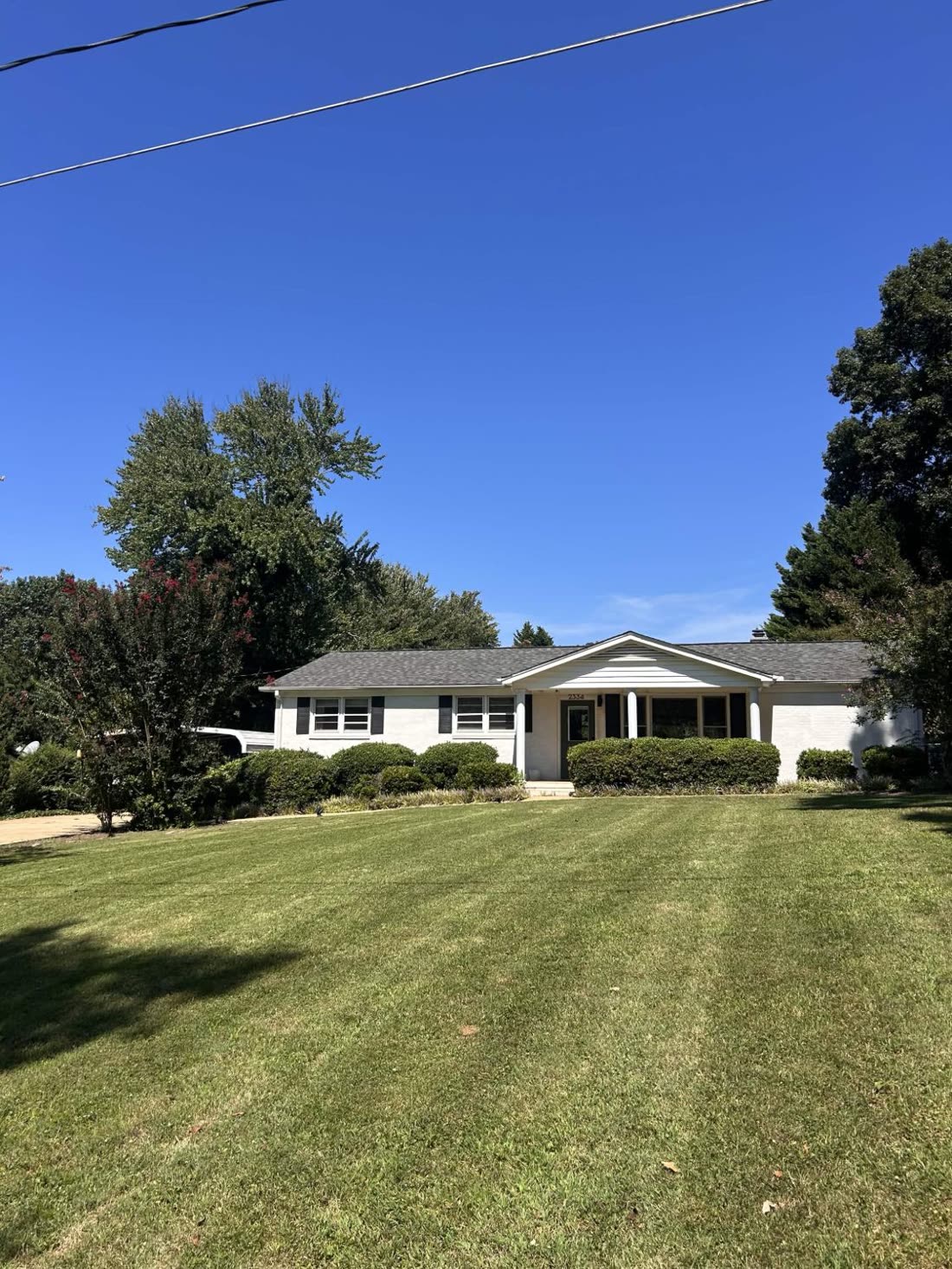 Striped front lawn mowed by StaufScape